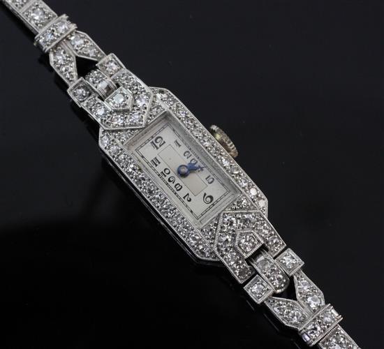 A ladys 1930s/1940s platinum and diamond Crusader cocktail watch, length 6.25in.